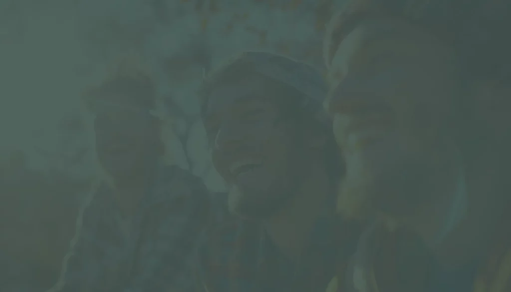 a group of men smiling